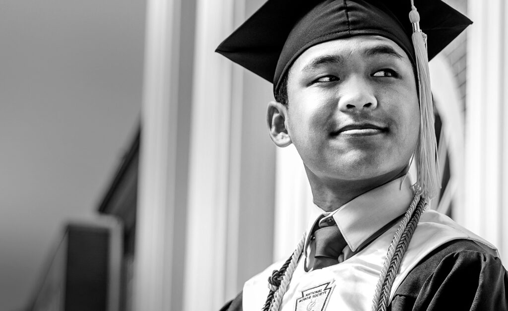 Graduate in cap and gown