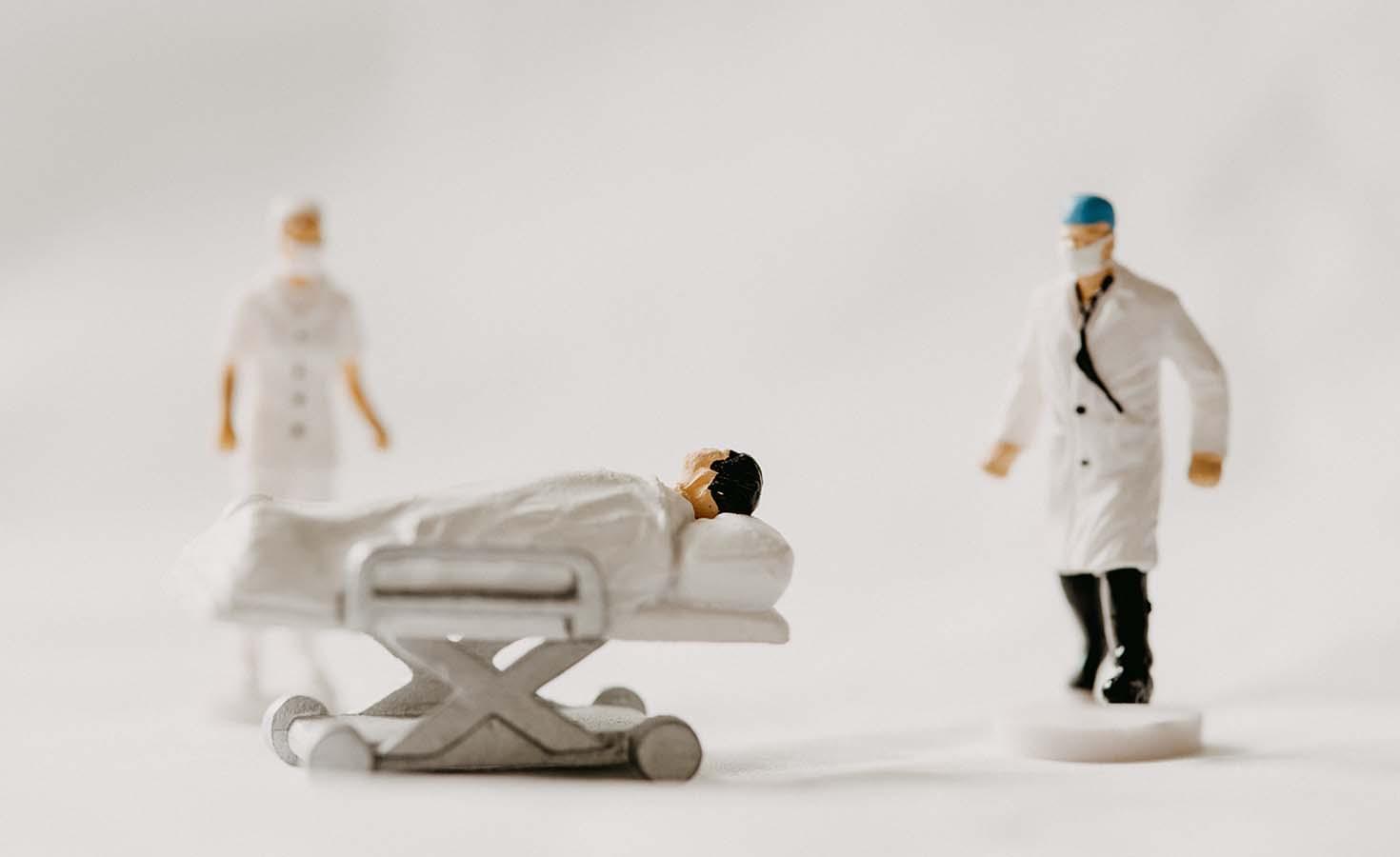 Miniature toys of doctors and patient